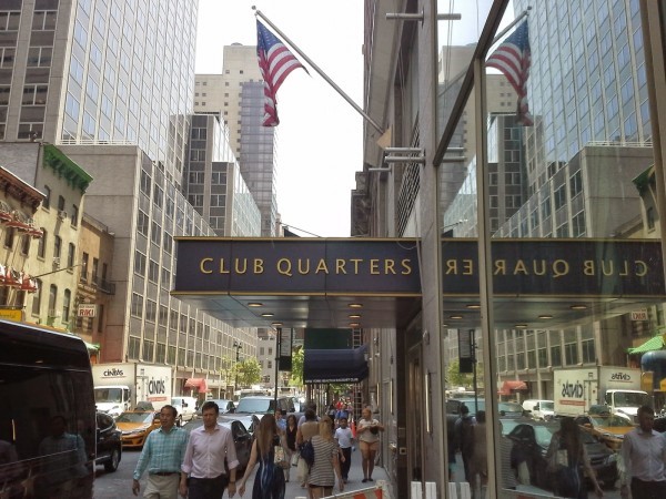 A roadside view of of Club Quarters Hotel in Times Square